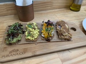 Toasts de entrada , difícil dizer qual o melhor ! at Purana in Sao Paulo