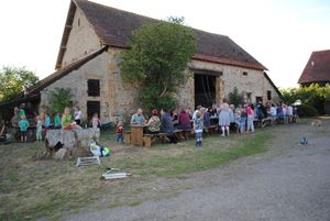 Eating outside, playground for the children at Camping et Gites Brenazet in Vernusse