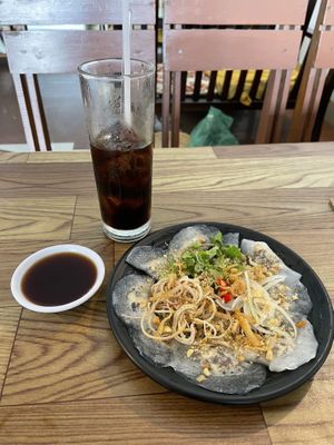 Seaweed and tofu dumplings with their iced coffee  at Chay Corner in Da Nang