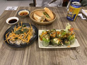 Vegetarian Sausage bahn mi, vegetable summer roll, and traditional dumplings  at Chay Corner in Da Nang