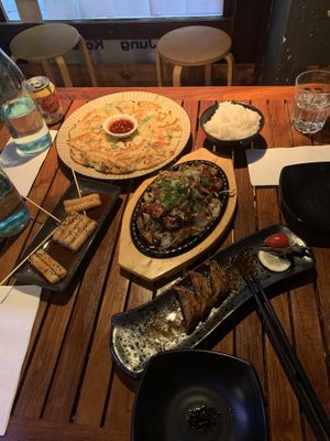 Dumpling gangjung, tteok skewers, veggie pancake, sizzling mushrooms   at May Q in Adelaide