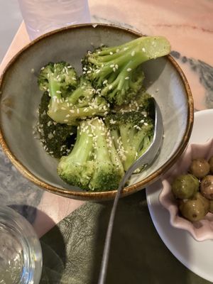 Broccoli with sesame seeds— this was delicious and perfectly cooked.   at Stressfree in Vila Nova De Milfontes