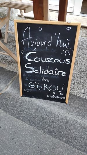 Sign on the Solidarity Couscous day at Gurou Street Food in La Rochelle