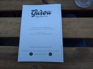 Flyer with adress and website at Gurou Street Food in La Rochelle