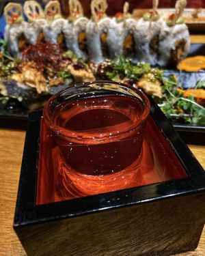 Over-poured sake. Scrumptious flavor with gorgeous presentation  at Tane Vegan Izakaya in Honolulu