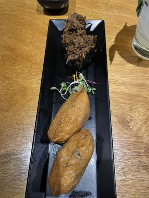 Gobo (top) and Inari (bottom) nigiri  at Tane Vegan Izakaya in Honolulu