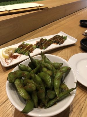 Grilled asparagus and garlic edamame  at Tane Vegan Izakaya in Honolulu