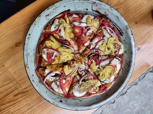 Vegan pizza with cashew cheese at Ginger Home in Sapa