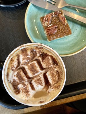 Pumpkin spiced latte and pecan cake  at Coffee #1 in Chepstow