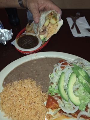 Had the potato enchiladas with red sauce,my husband had a bean rice, & potato burrito. Ask for their vegan menu, lots of choices! They were both really good. The chips/salsa was  at El Charrito Market in Gilroy