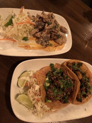 Tacos and calamari  at Millennium in Oakland