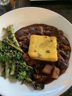 Polenta with porcini red wine sauce   at Millennium in Oakland