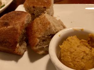 Homemade bread with carrot spread (ask for butter too)  at Millennium in Oakland