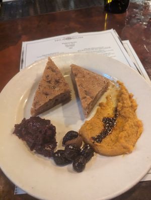 Focaccia, carrot butter, olives, beets at Millennium in Oakland