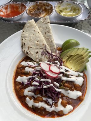 Red Chile Pozole. Would have taken more pics but we kept eating everything the second it hit the table! You can see the remnants of a salsa flight in the background though    at Bang Bang Kitchen in Seattle