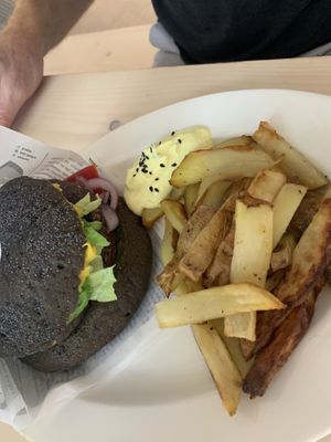 burger with black bun at Healthy Be Good in Gran Canaria