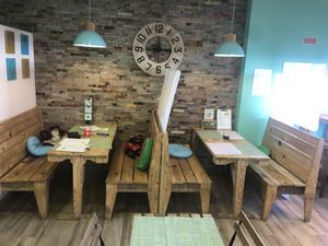 Lovely cosy diner seating  at Izzy's Market Vegetarian Boutique in Vila Do Bispo