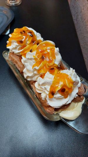 Churros Split - Doce Sem Leite com Maracujá at The Boinas in Sao Paulo