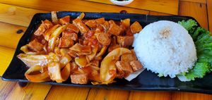 Vegan "fish cakes" with mushrooms and onions in a mild spicy-sweet sauce. at ROM Vegetarian Restaurant in Hoi An
