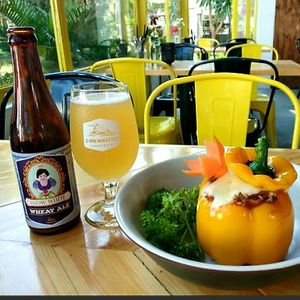 Everything so good. Fresh meal with a bell peper and passion fruit craft beer at ROM Vegetarian Restaurant in Hoi An