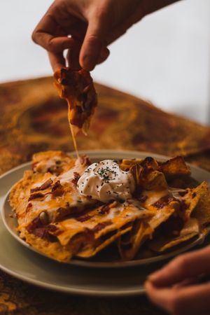 Cheesy nachos goodness - add a serving of vegetarian meat to make it a meal! at Bonthé in Granby