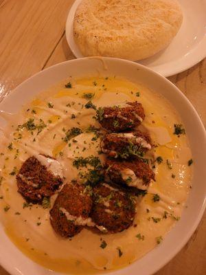 Hummus with falafel and bread at Falafel Bocas Sababa in Bocas Del Toro