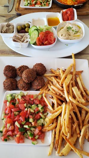 Falafel plate (comes on 3 plates; pita missing from photo). at Falafel Bocas Sababa in Bocas Del Toro