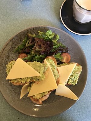 Sourdough toast w/ avo and vegan cheese at Sustain Cafe in Lawson