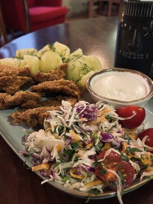 Breaded oyster mushroom with dill potatoes, salad, and chili mayo   at no bones in Krakow