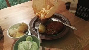 "Meat" cutlet with additional fries at no bones in Krakow