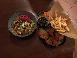 Bulgogi and deep fried mushrooms with French fries   at no bones in Krakow