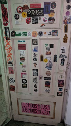 Door of stickers at no bones in Krakow