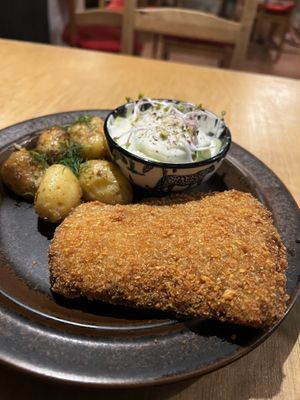 Vegan pork cutlet with potato and cucumber salad was delish   at no bones in Krakow