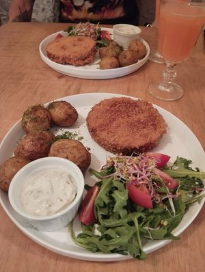 Potato with no-fish cutlet and salad at no bones in Krakow