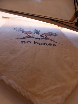 "no bones" banner in the courtyard at no bones in Krakow