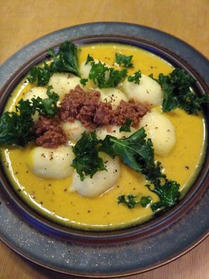 Gnocci with cheese and mushrooms inside, and pumpkin sauce at no bones in Krakow