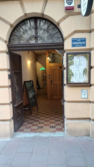 Sign above the door, then you step into the corridor - first-time visitors; keep going! at no bones in Krakow