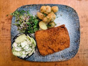 CLASSIC POLISH "PORK CHOP"
BREADED SOY CUTLET, POTATOES, CUCUMBER WITH CREAM, SPROUTS at no bones in Krakow