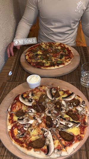 Mushroom and sausage pizza at no bones in Krakow