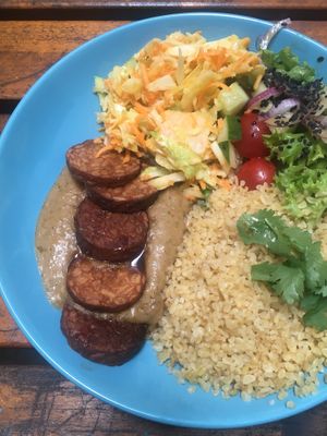 Tempeh teriyaki with rice, veggies and satay sauce  at no bones in Krakow