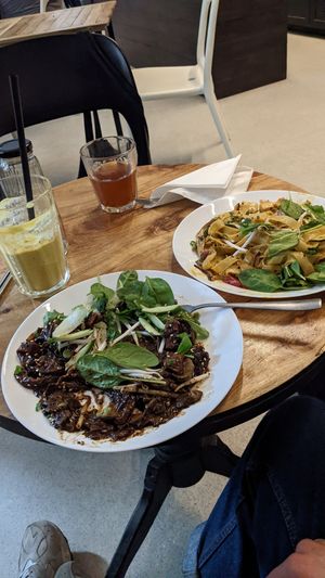Black bean pad thai, mango pad thai, mango lasso, comboocha at Tajfun in Wroclaw