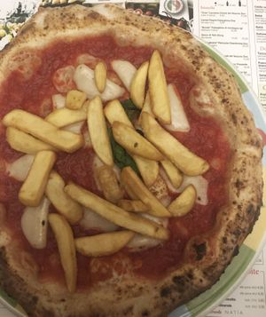 Pizza with vegan mozzarella and fries at Rossopomodoro in Padua