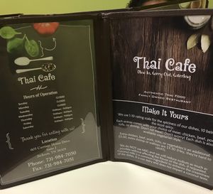 Wed-Sat 11-9. 
605 Carriage House Dr. 
Suite J Jackson, TN 
Spice scale 1-10
No MSG
Coconut milk common ingredient.  at Thai Cafe in Jackson