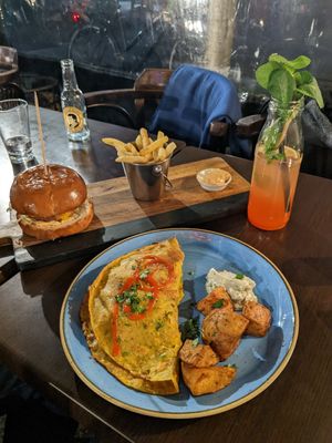 burger and chickpea omlett at Kuli Alma in Frankfurt