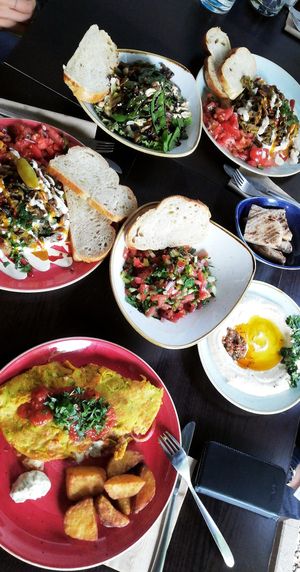 chickpea omlette, shawarma, hummus, summer salad, israeli salad at Kuli Alma in Frankfurt