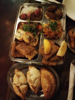 Tabla para dos personas + empanadas at Shipibo Bistro Amazonico in Ramos Mejia