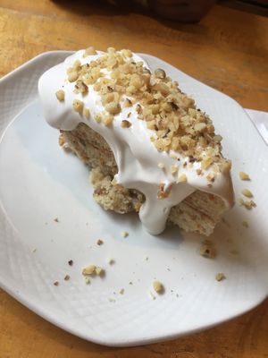 Cake with vegan cream cheese frosting. So good! at Village Natural in New York City