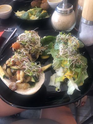 Steamed bun with veggies and a side salad! at Marshal Food in Szczecin