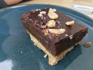 Peanut chocolate caramel cake. So yummi! at Satellite Cafe in Falmouth