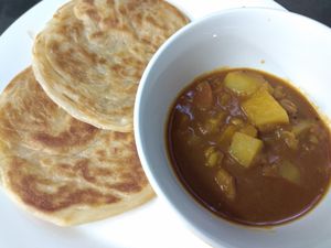 Roti Canai (malaysian style flat bread) with vege dhal curry.   at Selera Malaysia Bistro in Aberdeen